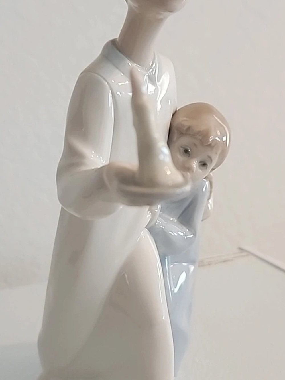 Lladro Porcelain Figurine of Boy Holding Candle With Arm Protecting Girl
